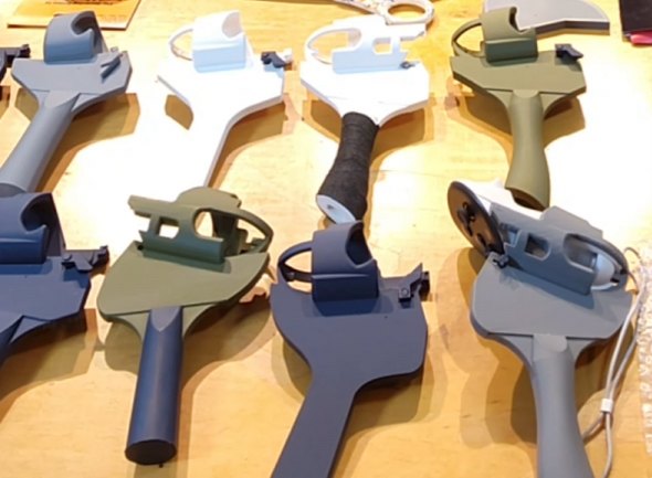 Six different Ls4life adapters in various colors laid out on the workbench