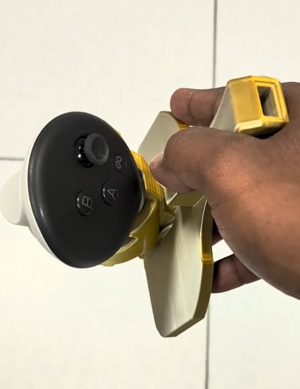 Golden penhold Ls4life adapter held in hand
